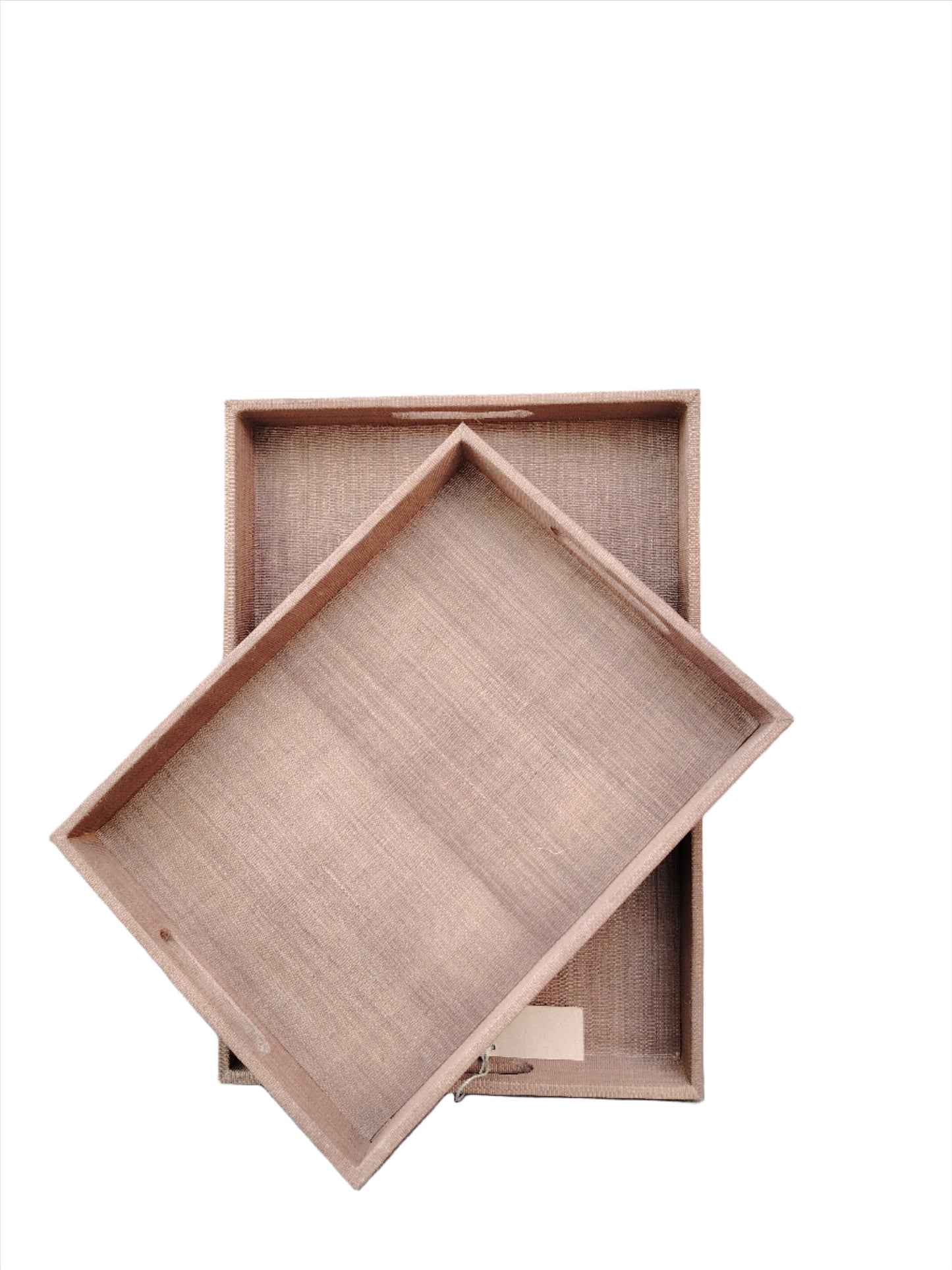 Natural Simple Decorative Trays Set of 2 in semi-light brown, featuring handwoven plant fiber, styled with decorative items on a coffee table.