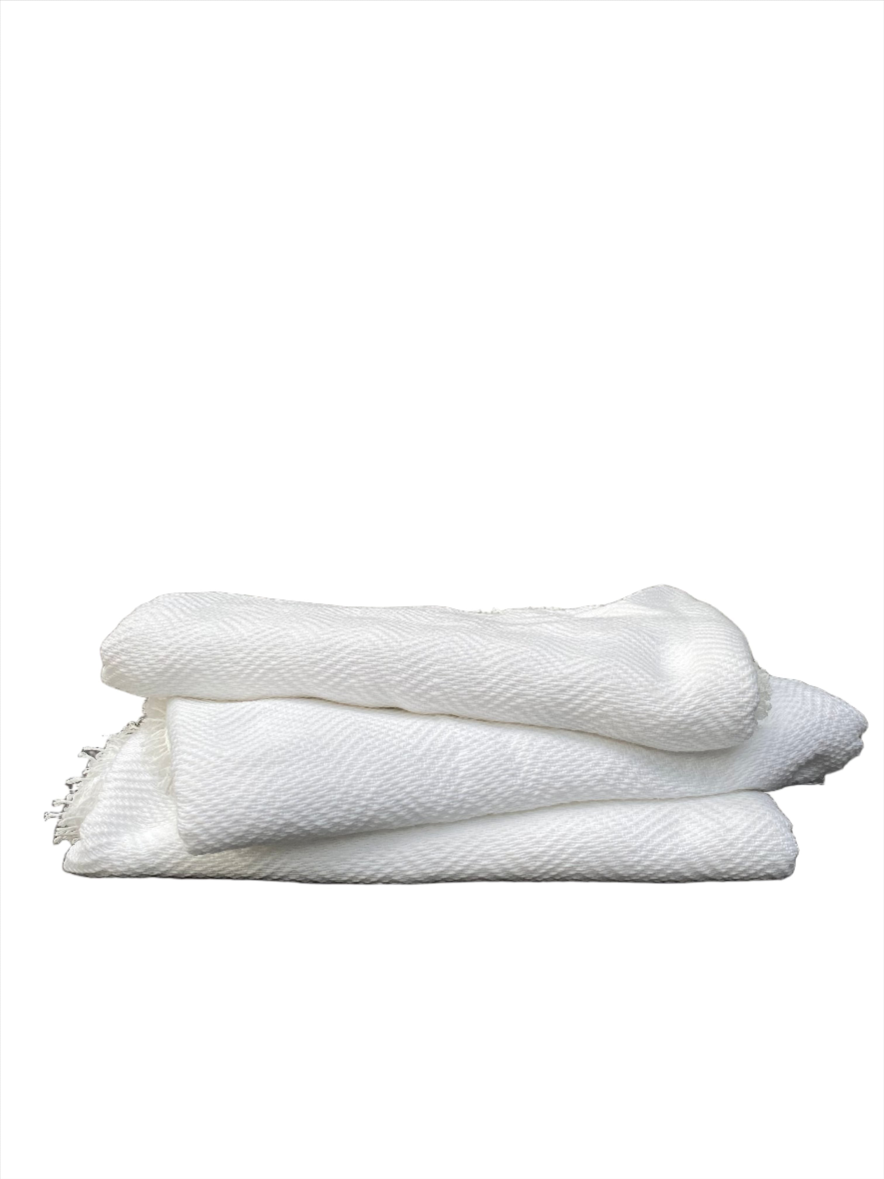 Embrace tradition with the Percy Woven Blanket from La Union. Handcrafted by skilled artisans using sustainable practices, this eco-friendly blanket brings warmth, texture, and cultural heritage to your home decor.