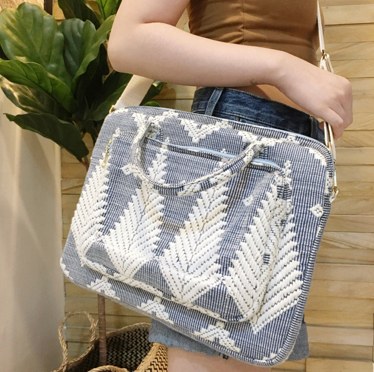 Dani Inabel Laptop Bag, handwoven from Abel Iloco fabric in the Philippines, showcasing intricate geometric patterns inspired by nature. This eco-friendly laptop bag blends traditional craftsmanship and functionality, crafted by skilled Ilocos artisans using centuries-old weaving techniques. Made with 50% cotton and 50% polyester, the bag offers durability with a removable, adjustable cotton strap. Ideal for work, school, or casual outings, this laptop bag supports sustainable living and Filipino heritage.