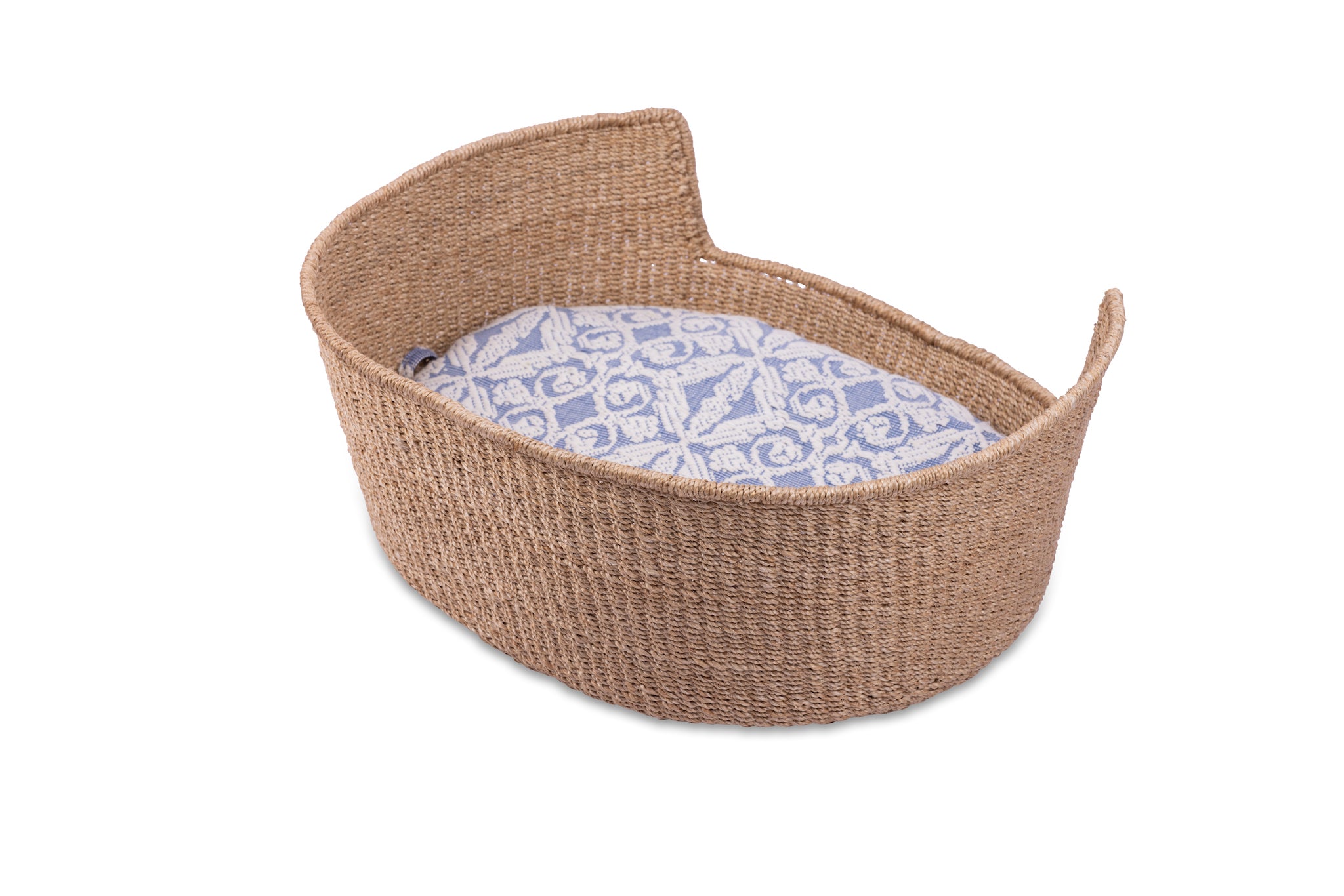 Eco-friendly Tippy Pet Bed made from 100% natural plant fiber with a stylish Inabel handwoven fabric cushion. Perfect for small dogs and cats, offering comfort and sophistication for modern Filipino interiors.