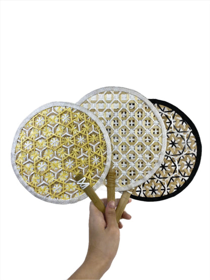 Faustina Festive Woven Hand Fan made from eco-friendly materials, featuring a vibrant design perfect for weddings and parties. This lightweight and practical fan provides a refreshing breeze while supporting sustainability, making it an ideal accessory for celebrations.