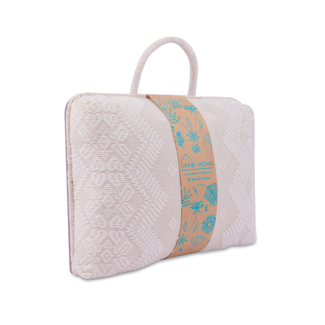 Handwoven Hazel Laptop Pillow Snow White made from Abel Iloco fabric, featuring geometric patterns inspired by nature, offering comfort and cultural heritage with a soft, durable design perfect for home or office use.