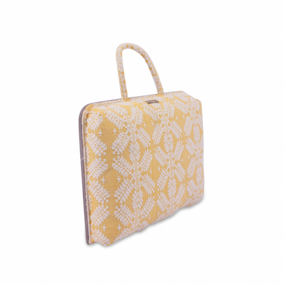 Handwoven Hazel Laptop Pillow Yellow Snowflakes made from Abel Iloco fabric, featuring geometric patterns inspired by nature, offering comfort and cultural heritage with a soft, durable design perfect for home or office use.