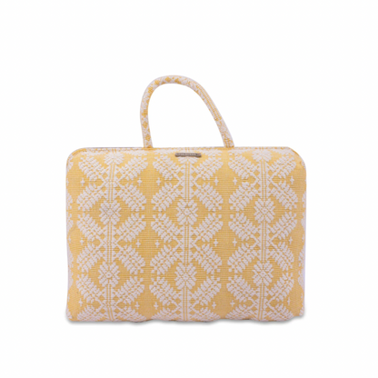 Handwoven Hazel Laptop Pillow Yellow Snowflakes made from Abel Iloco fabric, featuring geometric patterns inspired by nature, offering comfort and cultural heritage with a soft, durable design perfect for home or office use.