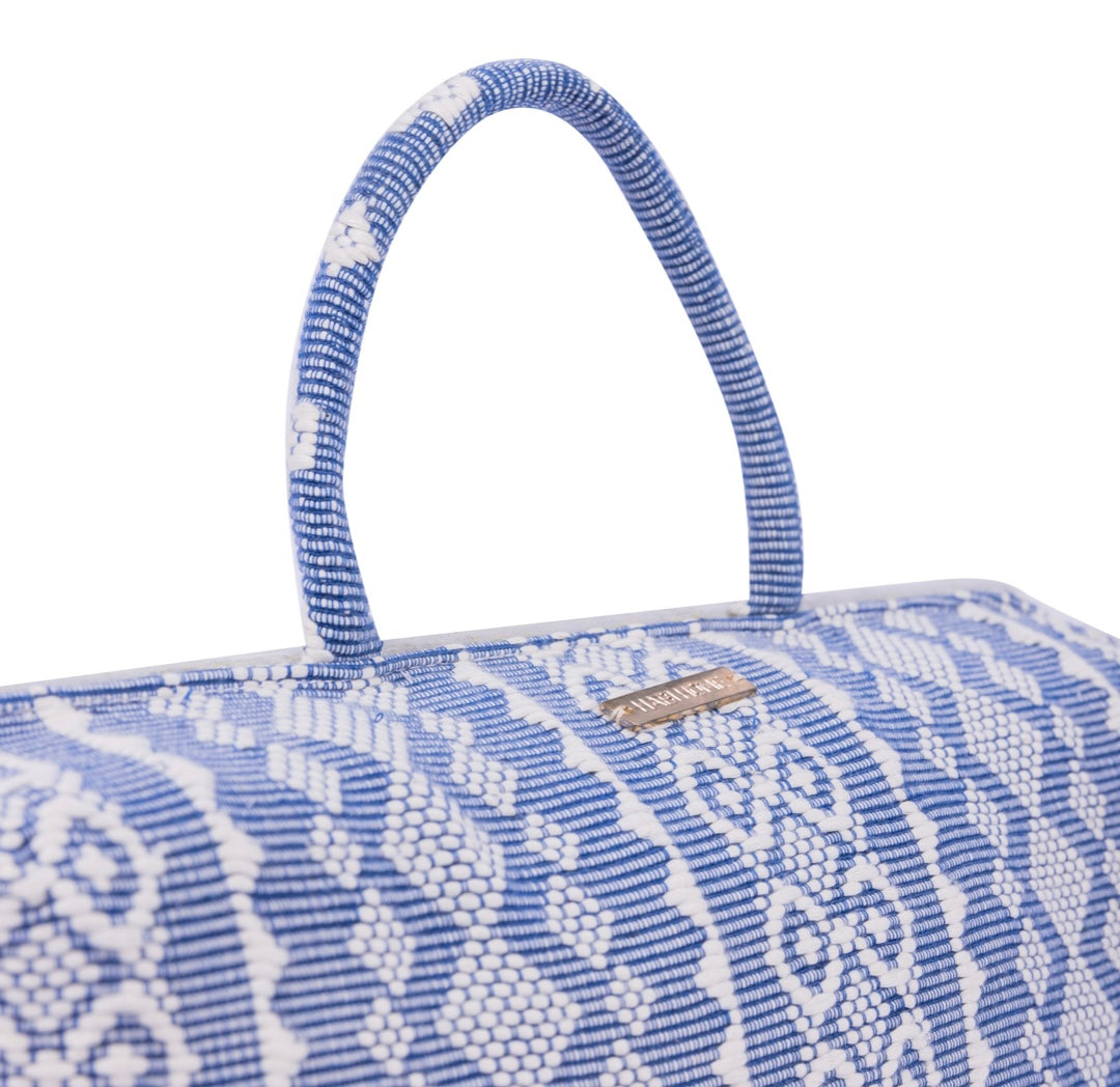 Handwoven Hazel Laptop Pillow Blue Ribbon made from Abel Iloco fabric, featuring geometric patterns inspired by nature, offering comfort and cultural heritage with a soft, durable design perfect for home or office use.