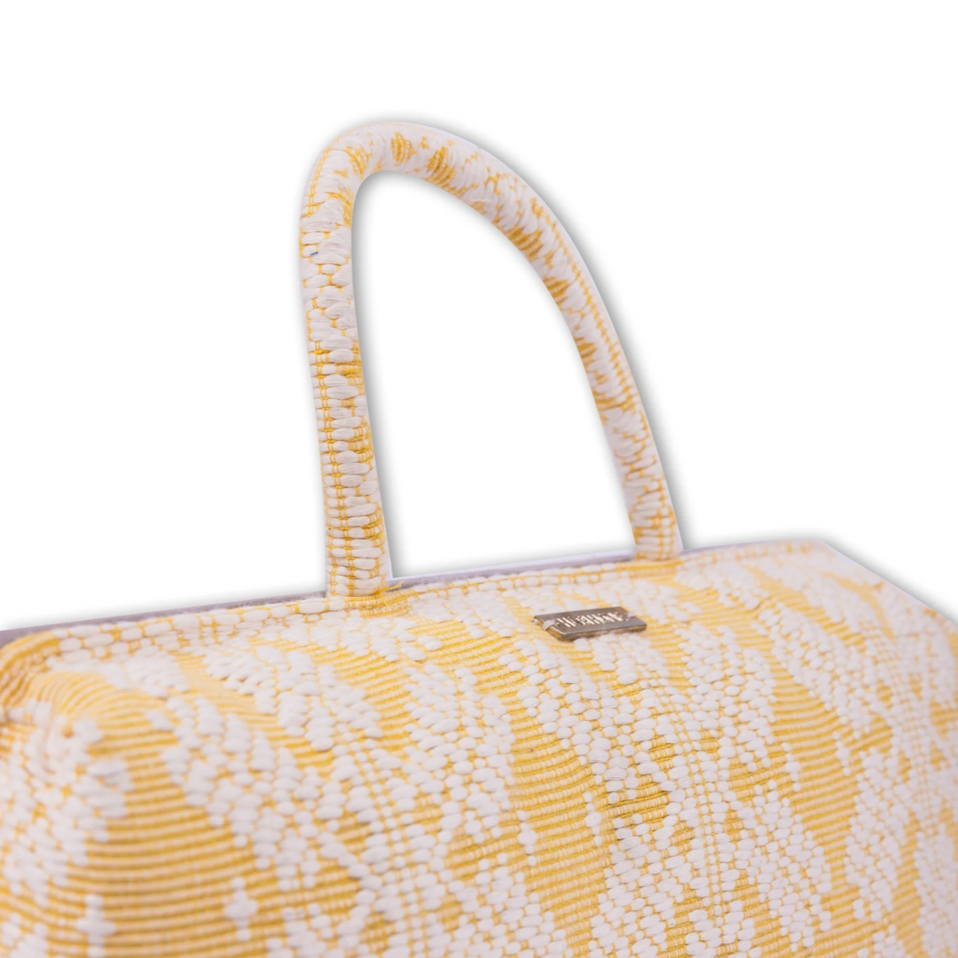 Handwoven Hazel Laptop Pillow Yellow Snowflakes made from Abel Iloco fabric, featuring geometric patterns inspired by nature, offering comfort and cultural heritage with a soft, durable design perfect for home or office use.