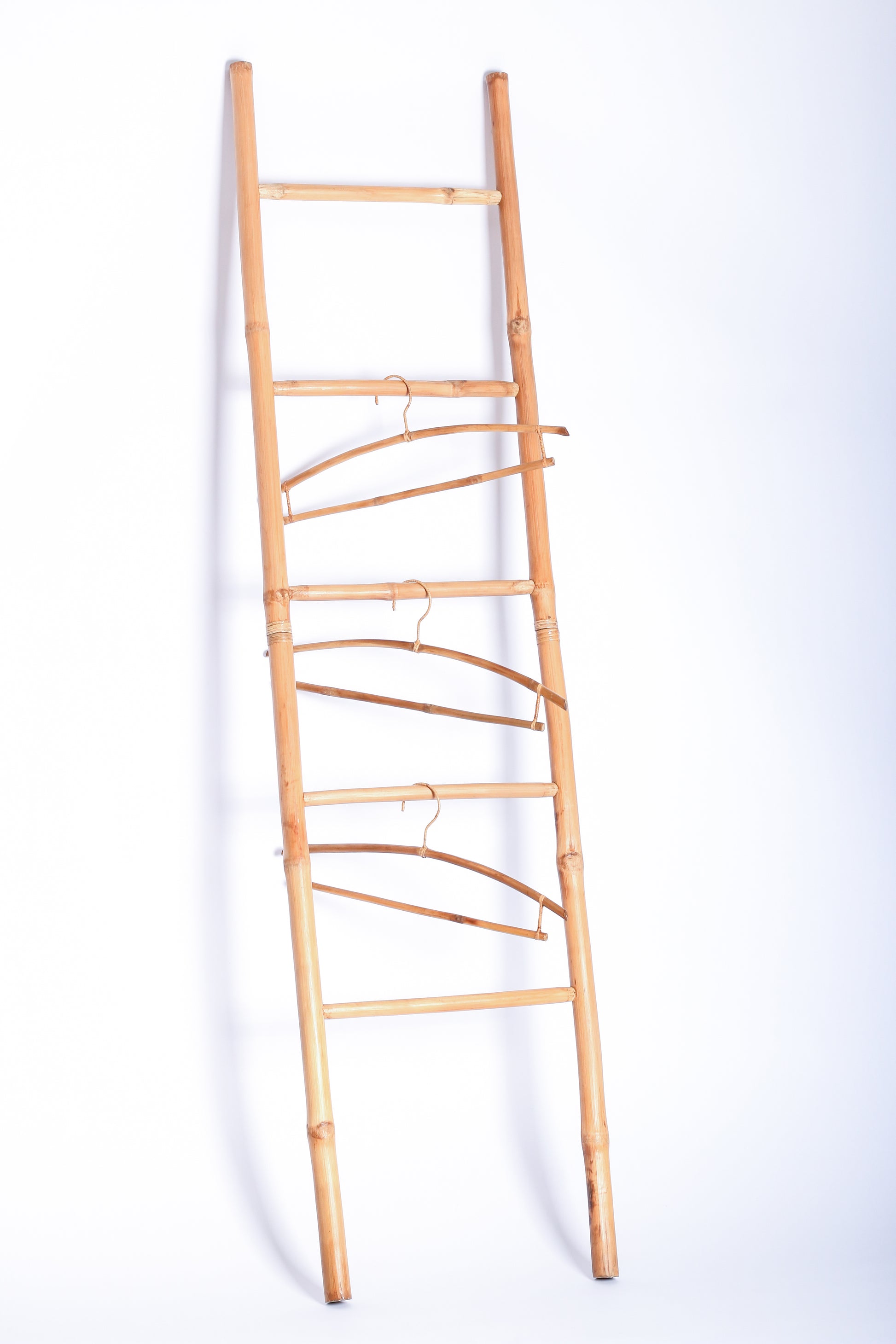 Veronica Bamboo Display Ladder crafted from sustainable bamboo, offering a multi-functional, eco-friendly storage solution. Perfect for towel racks, garment displays, and home decor, this elegant ladder adds a natural touch to any space.