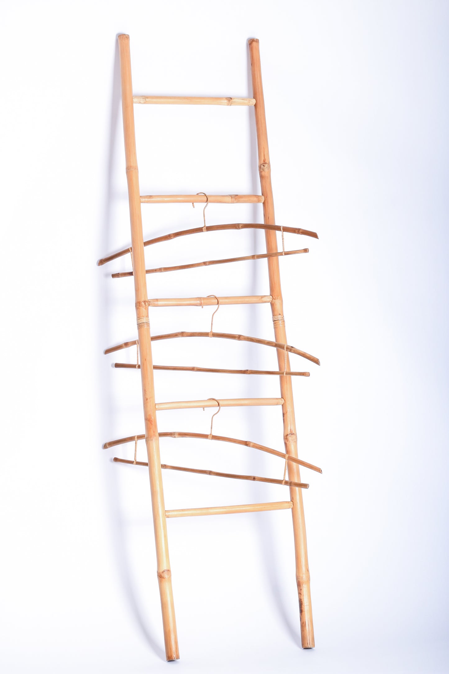 Veronica Bamboo Display Ladder crafted from sustainable bamboo, offering a multi-functional, eco-friendly storage solution. Perfect for towel racks, garment displays, and home decor, this elegant ladder adds a natural touch to any space.