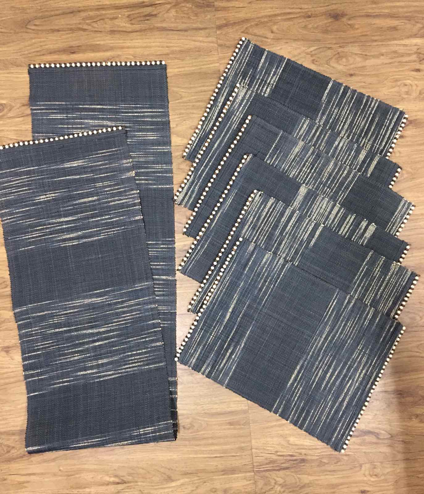 Abi Table Runner and Placemat Set of 6 in Black Ombre, handcrafted from 100% natural plant fiber, featuring a sleek and sustainable design.