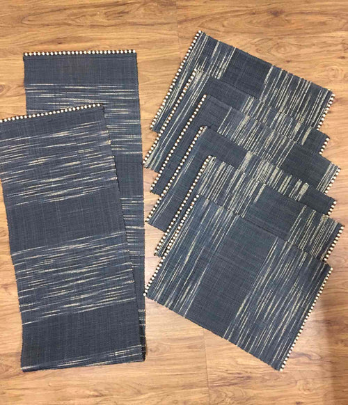 Abi Table Runner and Placemat Set of 6 in Black Ombre, handcrafted from 100% natural plant fiber, featuring a sleek and sustainable design.