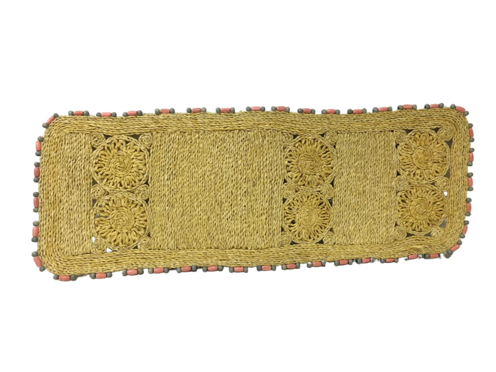 Add sustainable elegance to your home with the Anna Long Centerpiece Mat in Mustard Yellow. Perfect for centerpieces, buffets, or plant displays, made from 100% natural plant fiber.