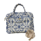 Dani Inabel Laptop Bag, handwoven from Abel Iloco fabric in the Philippines, showcasing intricate geometric patterns inspired by nature. This eco-friendly laptop bag blends traditional craftsmanship and functionality, crafted by skilled Ilocos artisans using centuries-old weaving techniques. Made with 50% cotton and 50% polyester, the bag offers durability with a removable, adjustable cotton strap. 