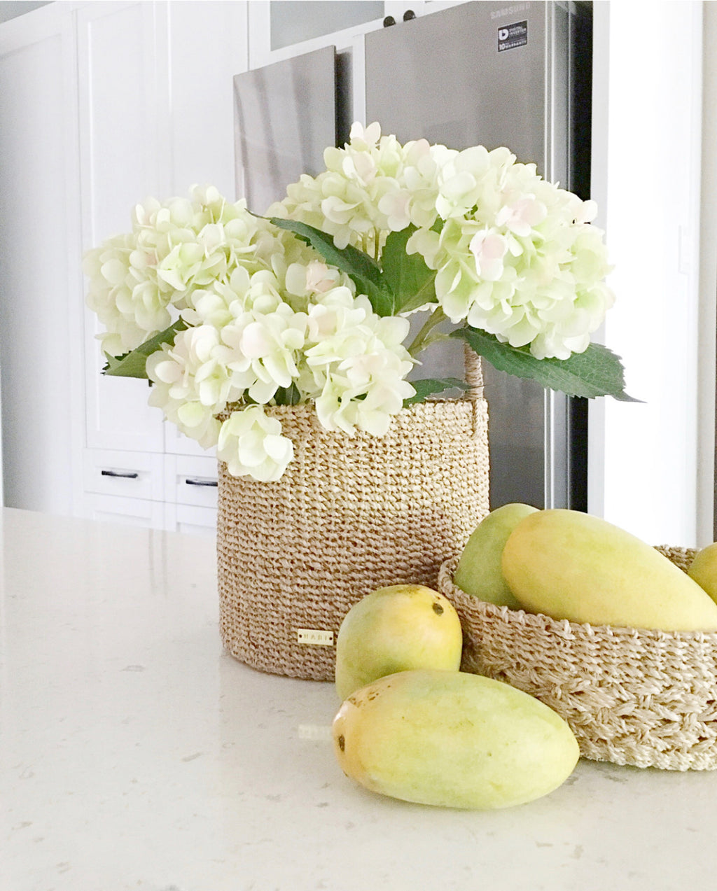 Dinah Catch All Basket made from 100% natural plant fiber, perfect for organizing essentials like keys, condiments, bath items, and vanity accessories. Versatile storage basket for entryways, kitchens, and bathrooms, adding charm and eco-friendly functionality to any space.