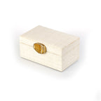 Karuna Raffia Jewelry Box, handcrafted from 100% natural raffia with a polished agate stone accent and hand-tooled brass detailing. Elegant, eco-friendly storage for jewelry and keepsakes.