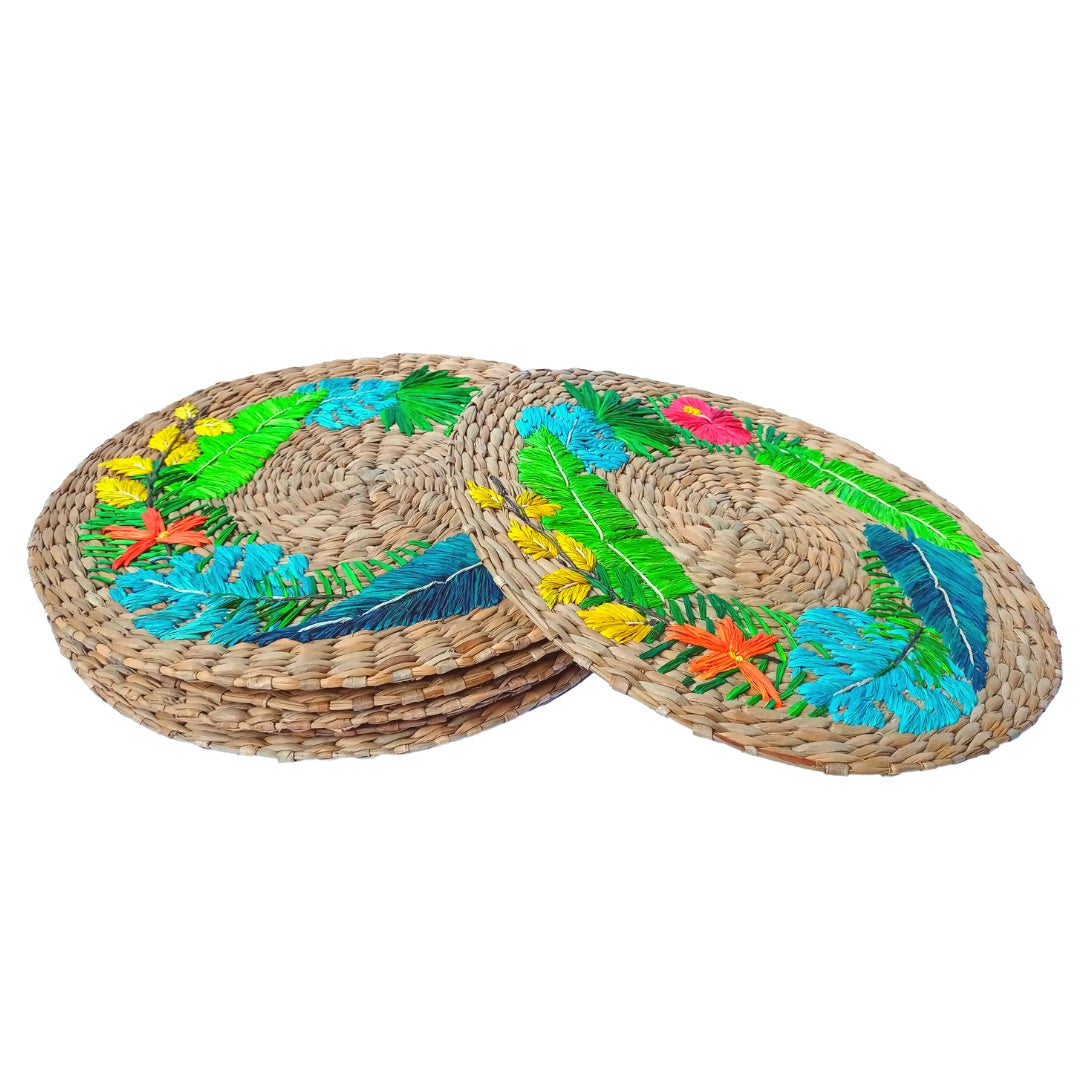 Lorenzo Tropical Seagrass Round Placemats set of 6, handcrafted from 100% natural plant fibers with embroidered designs of lemons and tropical leaves. Eco-friendly, durable, and stylish, perfect for enhancing your dining table decor.