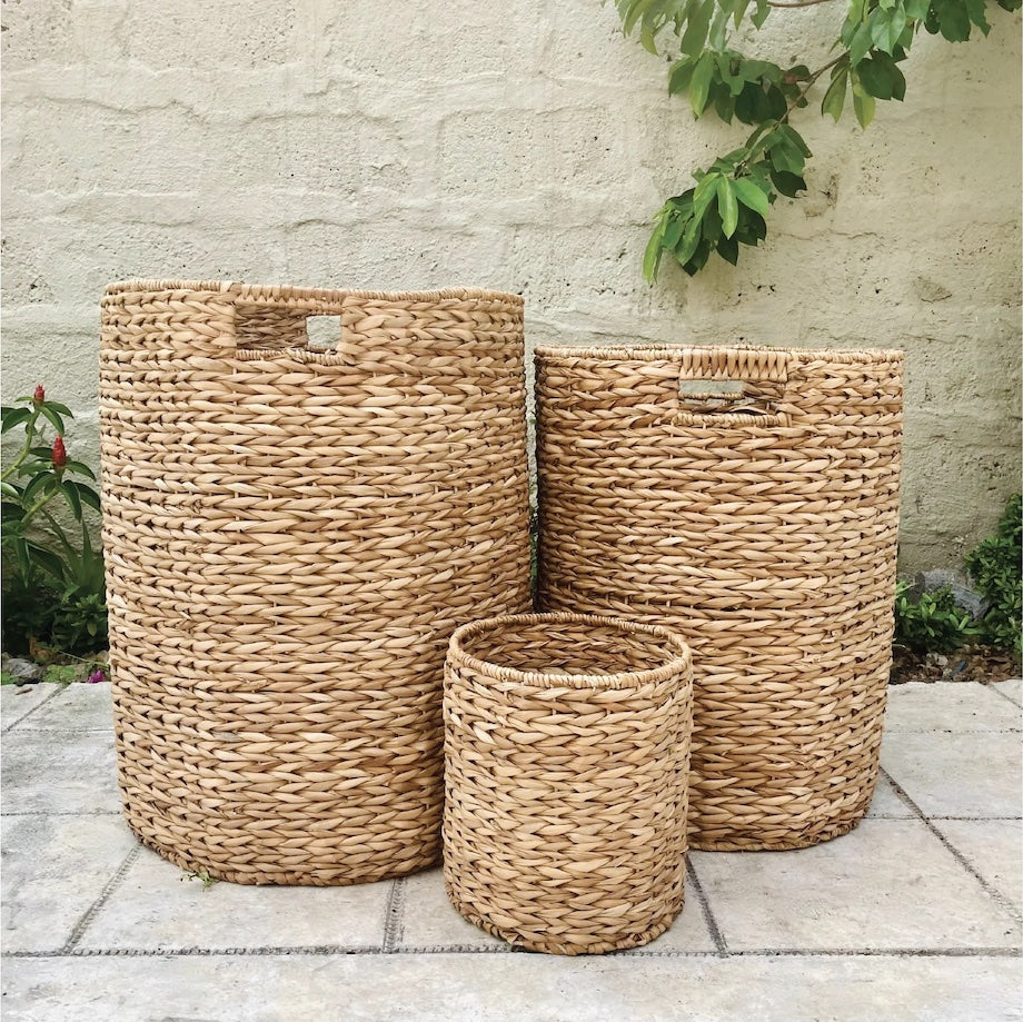 Set of 3 eco-friendly Gianna Basket Hampers, handcrafted from 100% natural plant fibers for stylish and sustainable storage; perfect for organizing laundry, toys, or household items in any room.