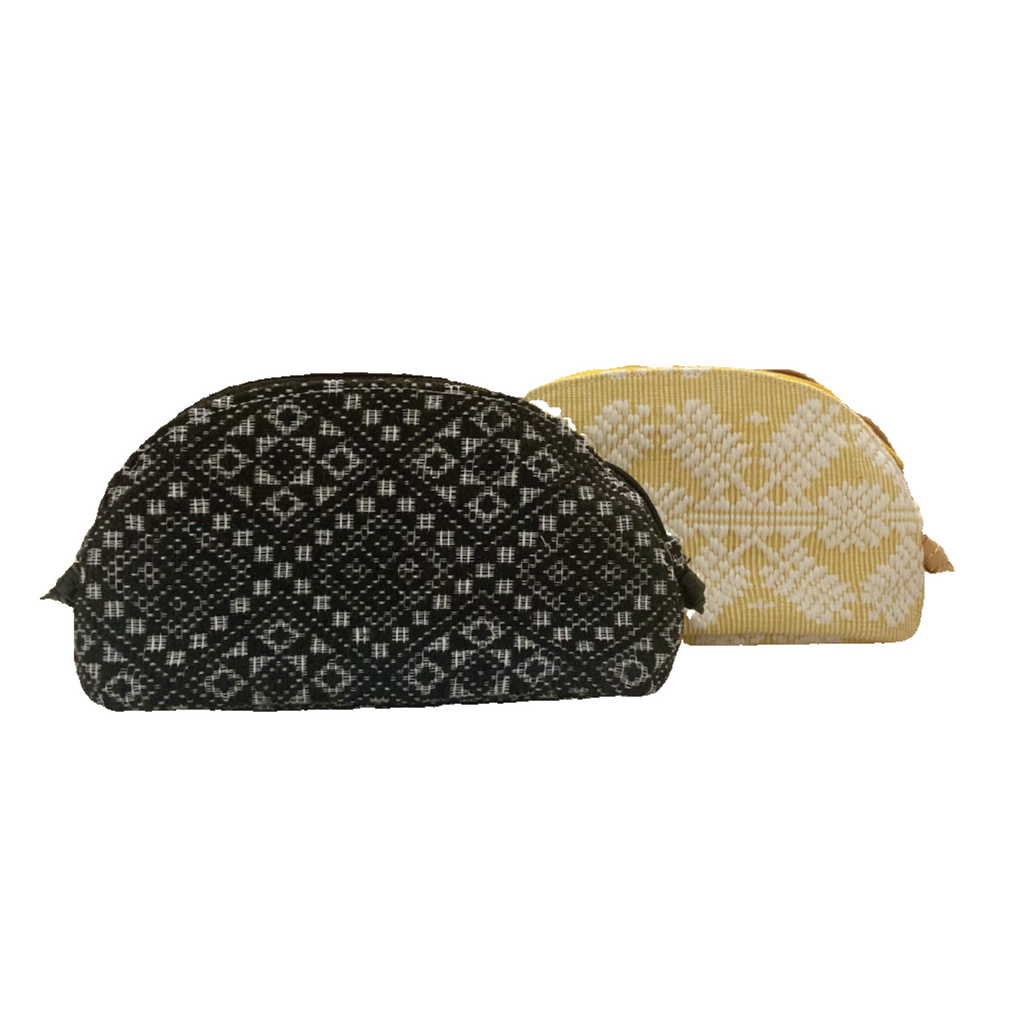 Katrina Abel Sling Bag, crafted from traditional Pinilian Inabel fabric, showcasing vibrant geometric motifs. Handwoven in the Ilocos region, with leather straps for modern functionality and artisan craftsmanship