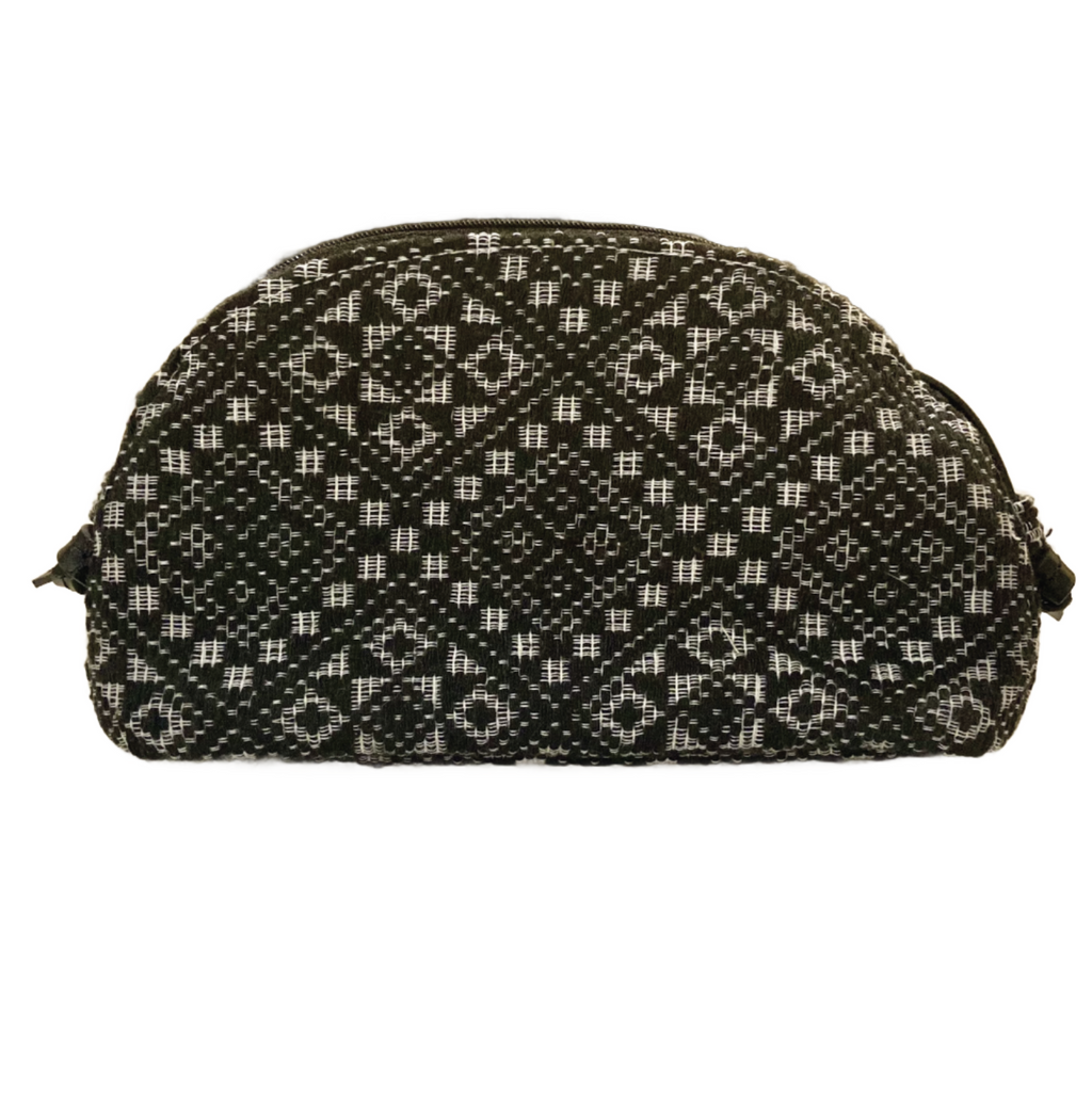 Katrina Abel Sling Bag Black Diamond, crafted from traditional Pinilian Inabel fabric, showcasing vibrant geometric motifs. Handwoven in the Ilocos region, with leather straps for modern functionality and artisan craftsmanship