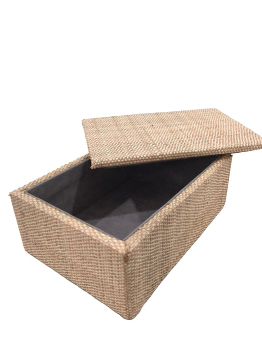 Organize your treasures in style with the Sophia Simple Jewelry Box - Toast. Handwoven from 100% natural raffia, this eco-friendly jewelry box offers elegant storage and supports sustainable craftsmanship.