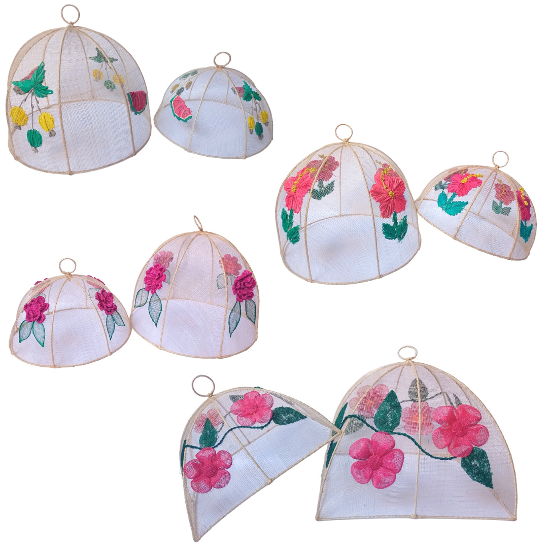 Julieta Woven Food Covers Set of two sizes, crafted from 100% natural plant fibers with vibrant embroidered designs. Eco-friendly, stylish covers for indoor and outdoor dining.