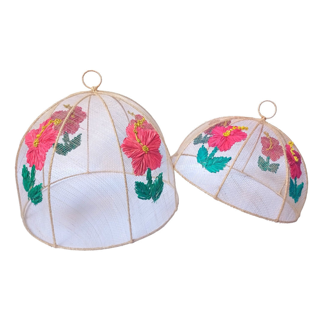 Julieta Woven Gumamela Food Covers Set of two sizes, crafted from 100% natural plant fibers with vibrant embroidered designs. Eco-friendly, stylish covers for indoor and outdoor dining.