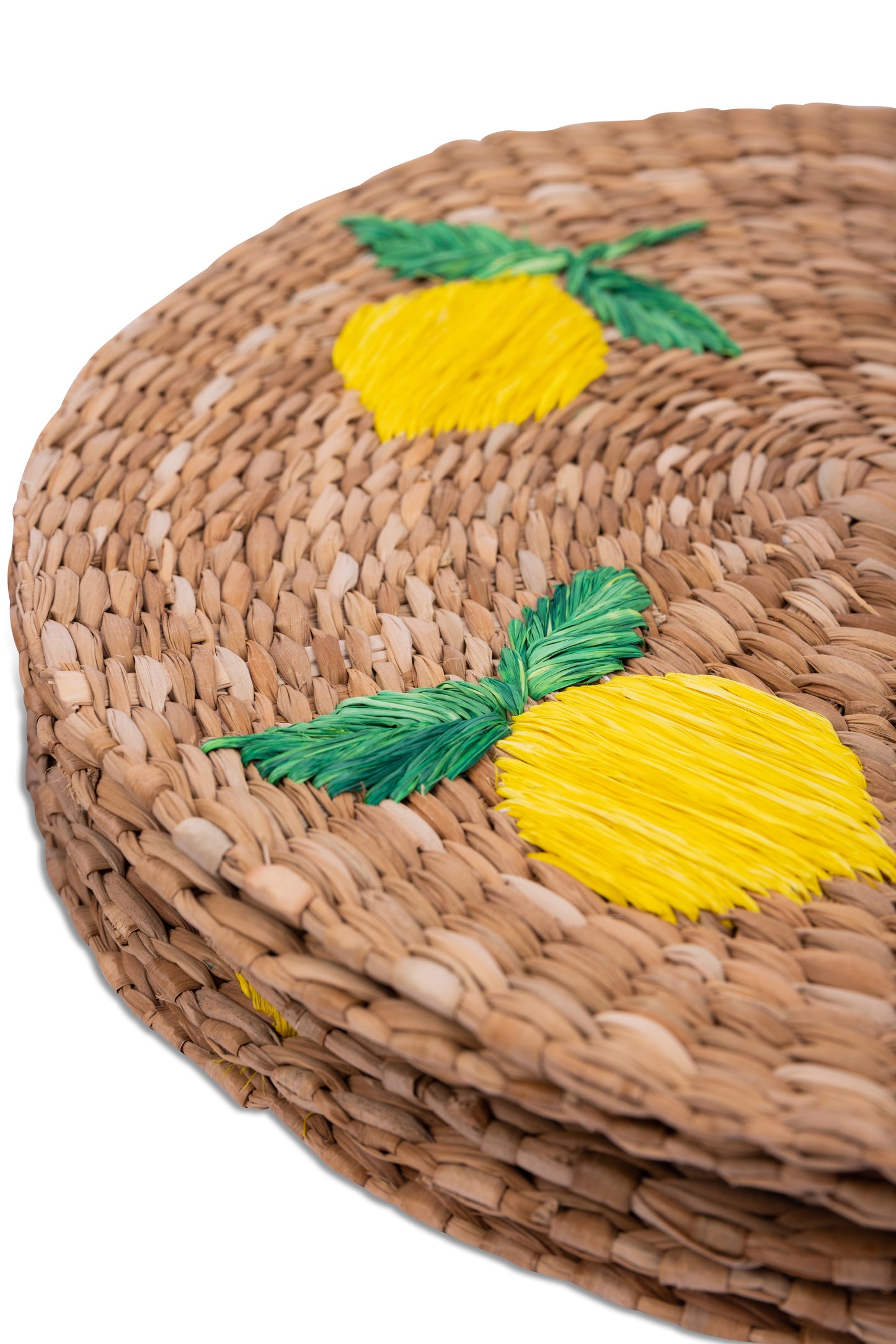 Lorenzo Lemons Seagrass Round Placemats set of 6, handcrafted from 100% natural plant fibers with embroidered designs of lemons and tropical leaves. Eco-friendly, durable, and stylish, perfect for enhancing your dining table decor.