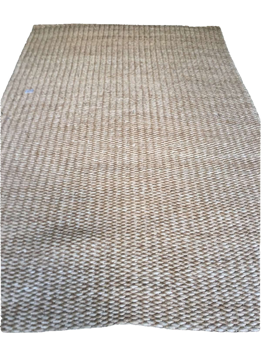 Elle Area Rug made from 100% natural plant fiber, perfect for adding texture and warmth to living rooms, bedrooms, and dining areas. Eco-friendly and versatile, it enhances a variety of home decor styles.