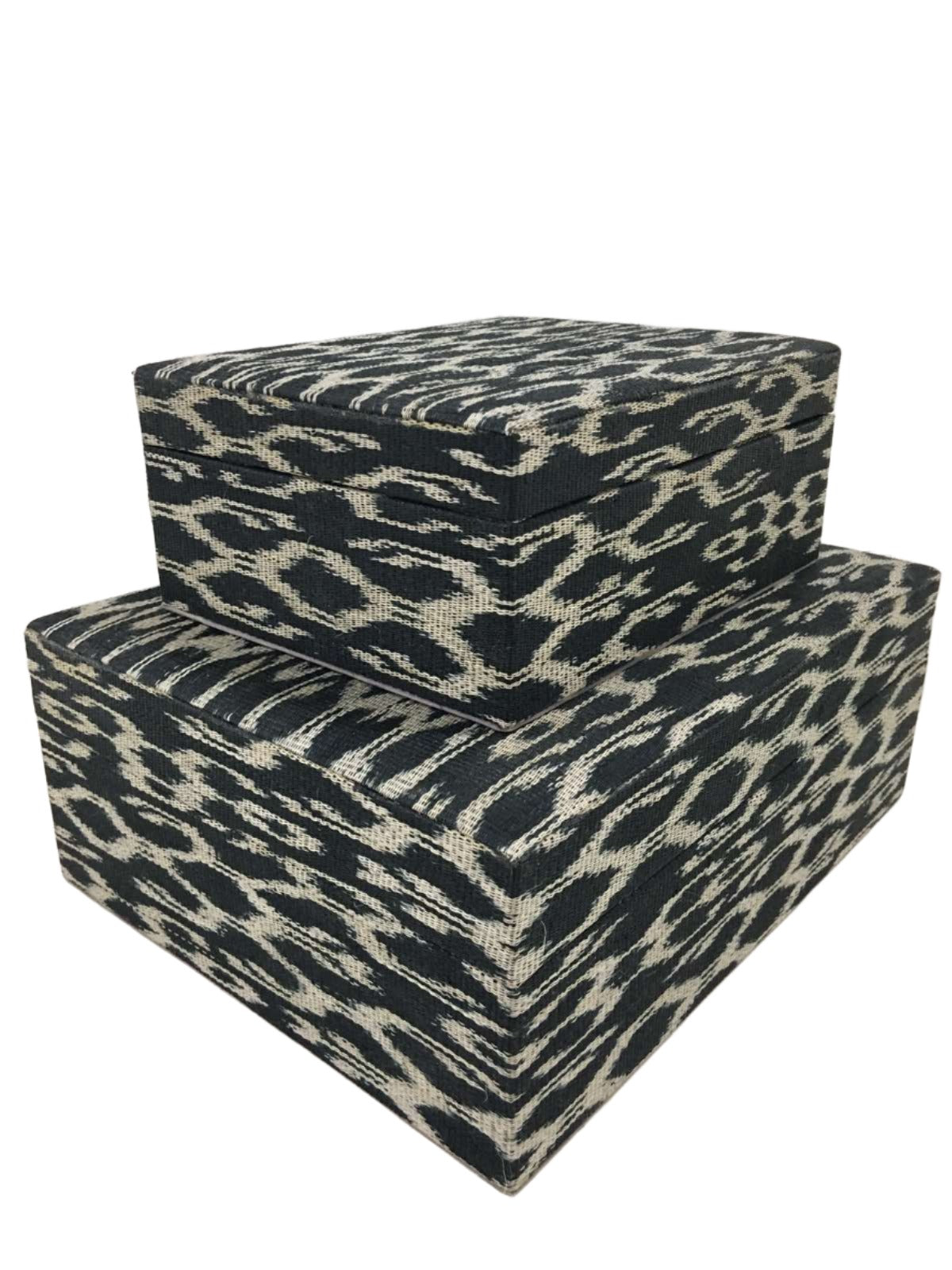 Eco-friendly Trixie Storage Boxes Black Traditional made from 100% natural plant fiber and tinalak handloomed fabric by the T'boli tribe. Featuring a luxurious faux suede lining, these boxes offer stylish and sustainable storage solutions for your home.