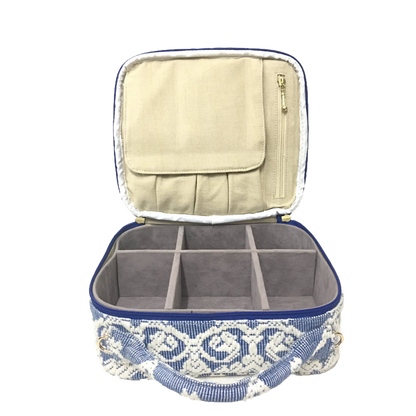 Dani Makeup Travel Bag, crafted with handwoven Abel Iloco fabric from the Ilocos region in the Philippines, featuring intricate nature-inspired patterns like stars, rivers, and florals. This makeup bag is spacious, ideal for organizing cosmetics and travel essentials, with 50% linen and 50% suede lining, and removable cotton straps. A tribute to Filipino heritage and sustainable craftsmanship. Spot clean and air dry to maintain its quality