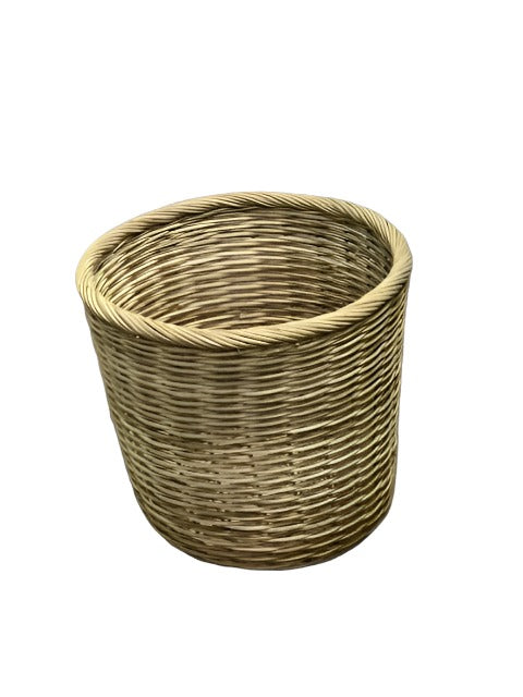 Tia Small Basket made from 100% natural rattan, perfect for organizing small office items or as a stylish planter.