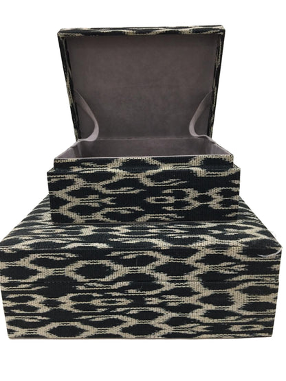 Eco-friendly Trixie Storage Boxes Black Traditional made from 100% natural plant fiber and tinalak handloomed fabric by the T'boli tribe. Featuring a luxurious faux suede lining, these boxes offer stylish and sustainable storage solutions for your home.