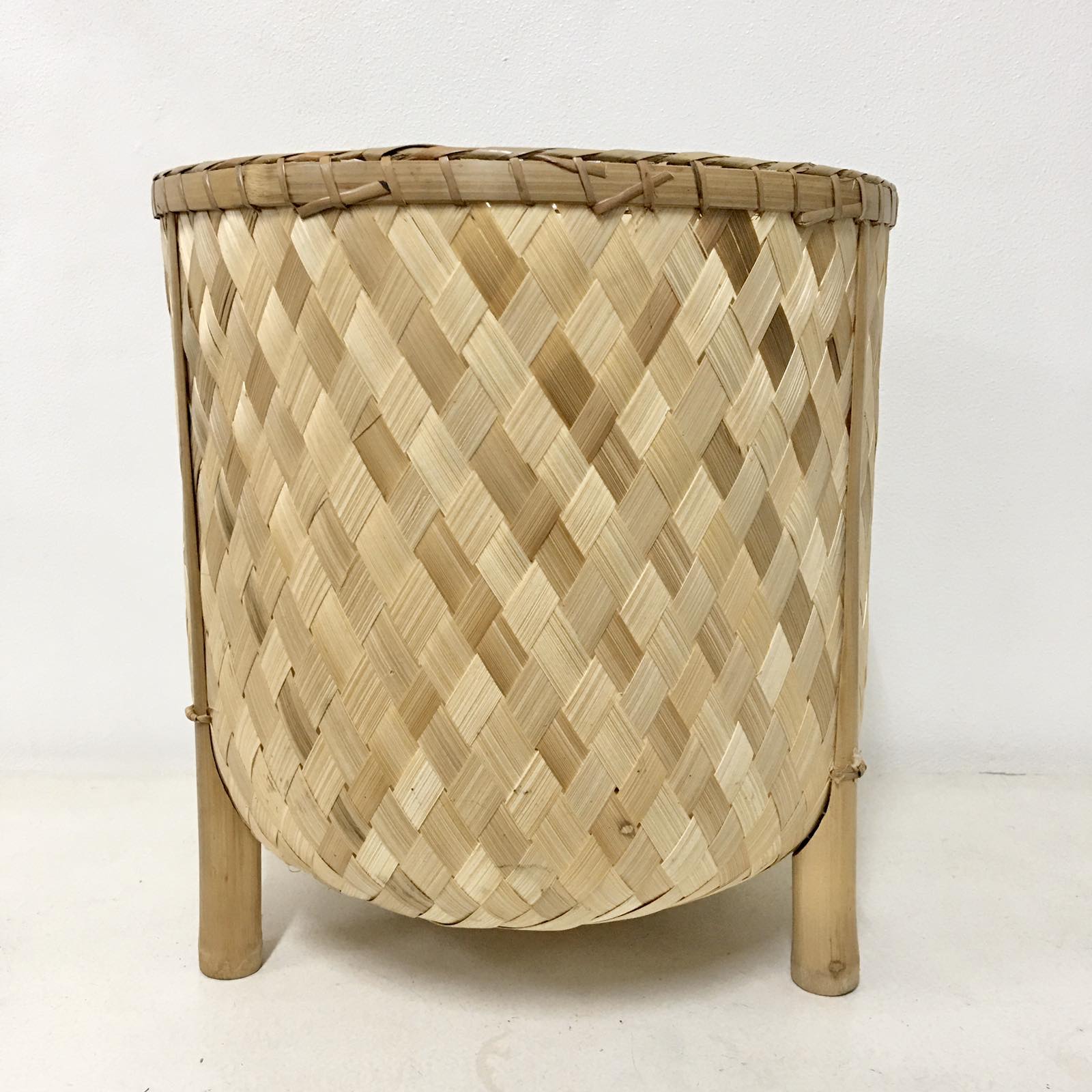 Veronica Bamboo Planter, 12-inch diameter, handcrafted from bamboo, ideal for displaying plants in eco-friendly style.