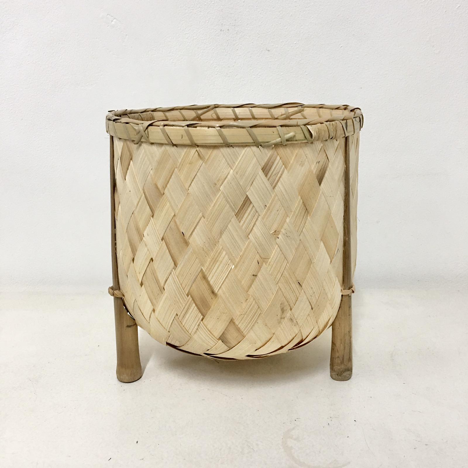 Veronica Bamboo Planter, 8-inch diameter, handcrafted from bamboo, ideal for displaying plants in eco-friendly style.