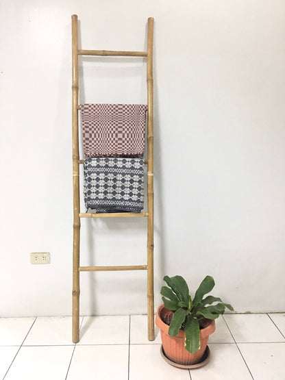 Veronica Bamboo Display Ladder crafted from sustainable bamboo, offering a multi-functional, eco-friendly storage solution. Perfect for towel racks, garment displays, and home decor, this elegant ladder adds a natural touch to any space.