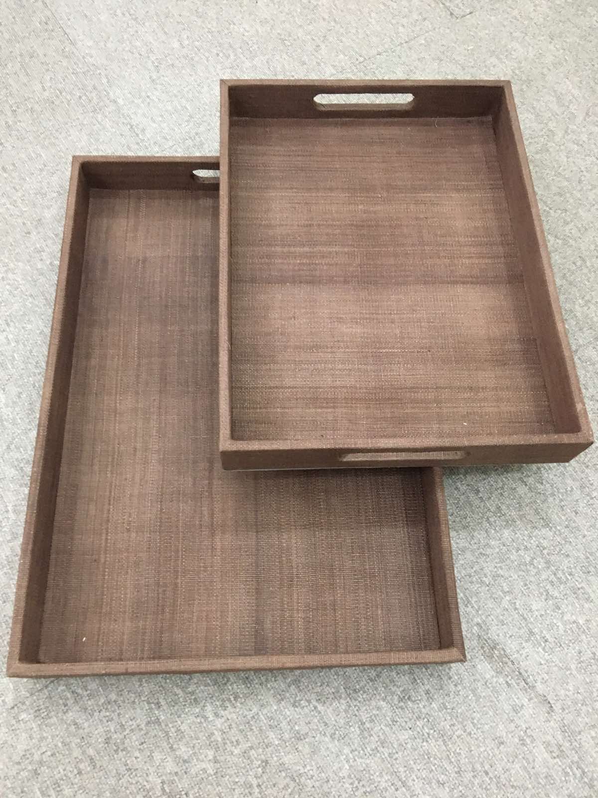 Zoey Decorative Trays Set of 2 in brown, made from natural plant fiber, perfect for organizing and serving with rustic charm.