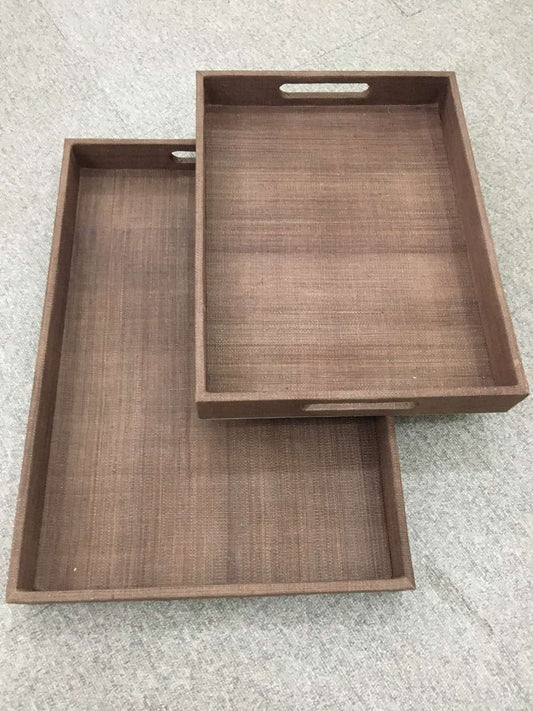 Zoey Decorative Trays Set of 2 in brown, made from natural plant fiber, perfect for organizing and serving with rustic charm.